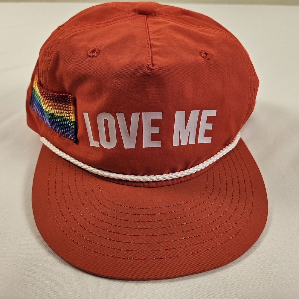 Bold Red "LOVE ME" Pride Hat with Rainbow Patch – Adjustable Snapback Cap